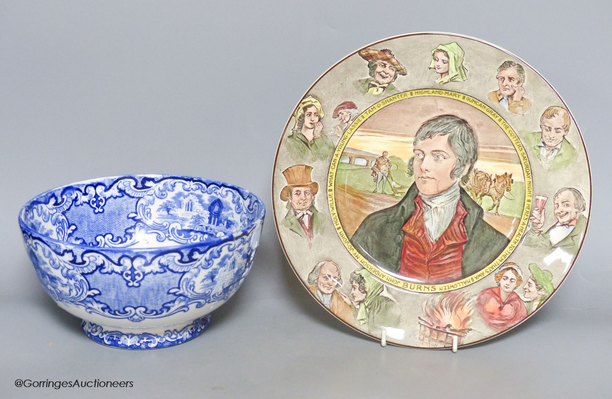 A Royal Doulton 'Burns' plate, no.D6344, diameter 26cm, and a George Jones & Sons Abbey pattern blue and white bowl